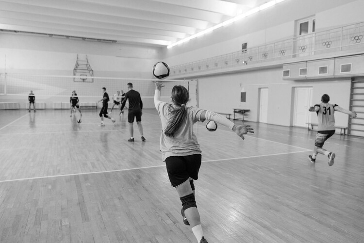 Playing volleyball